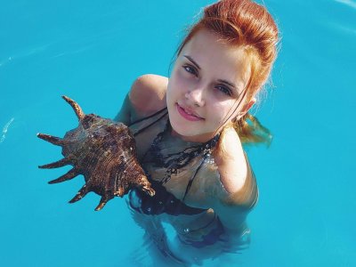 प्रोफ़ाइल की तस्वीर Red_Mermaid